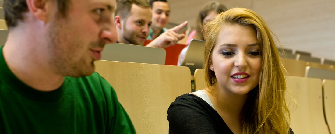 Two students in one lecture theatre